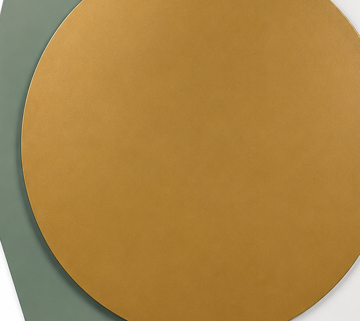 Golden Orbit, a circular gold form framed by sculpted geometric panels