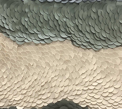Canopy Scales, a circular artwork formed from overlapping white and green scales