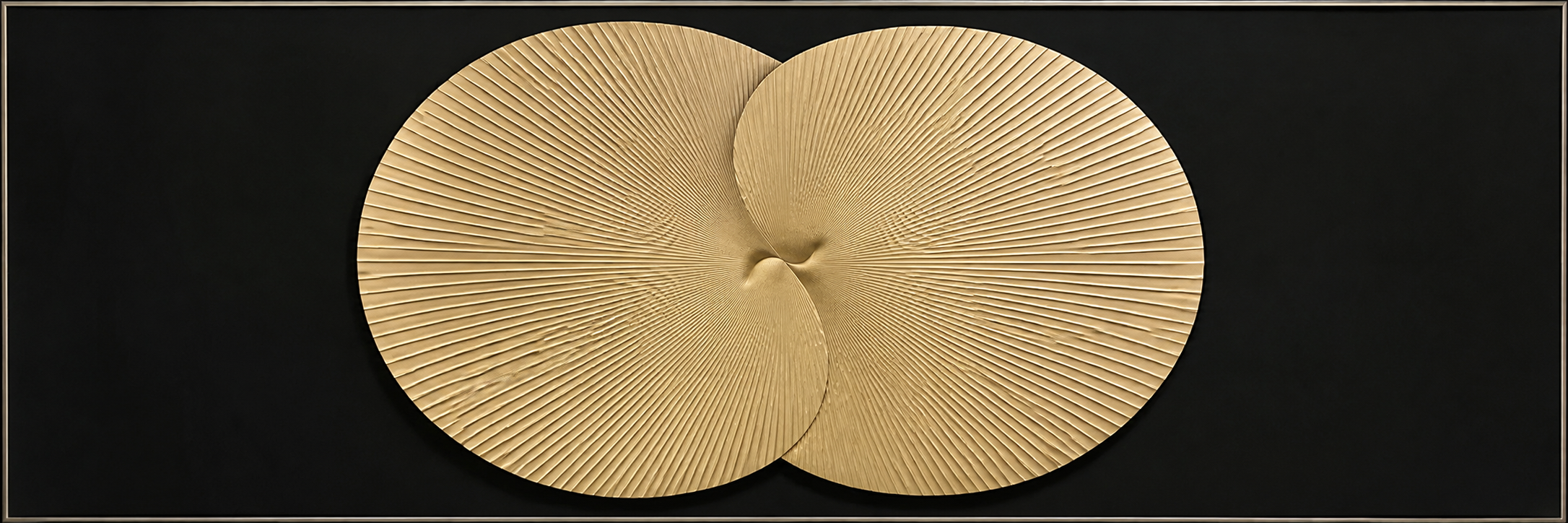 Golden Eclipse, two radiant gold discs meeting against a deep black ground