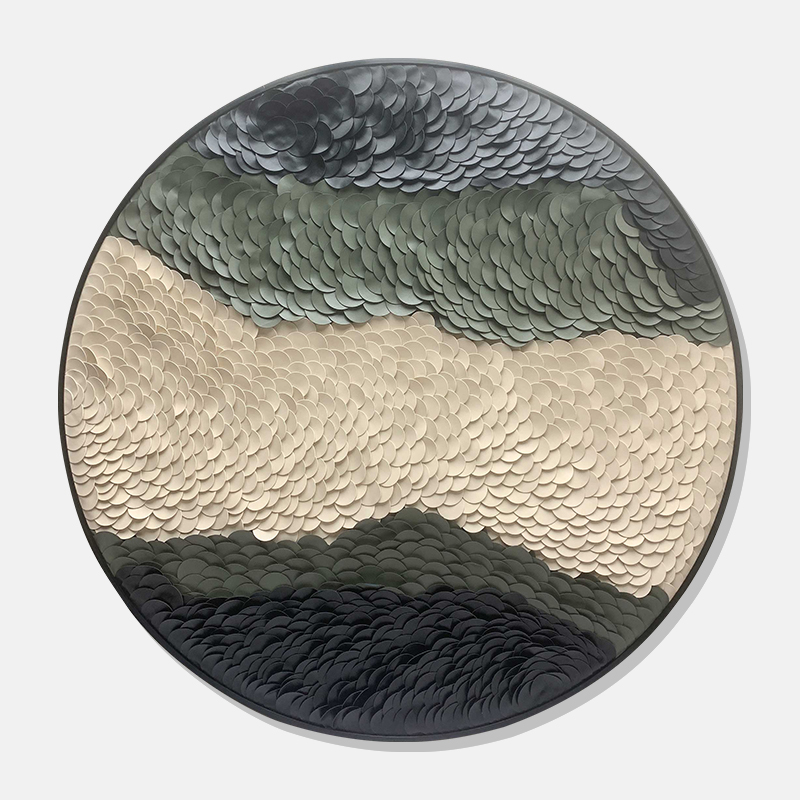 Canopy Scales, a circular artwork formed from overlapping white and green scales